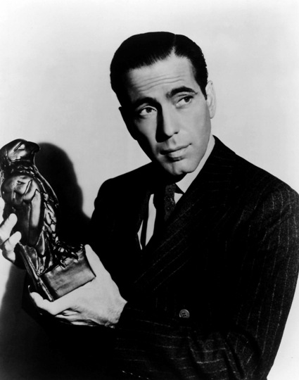 Bogie Holding the Maltese Falcon